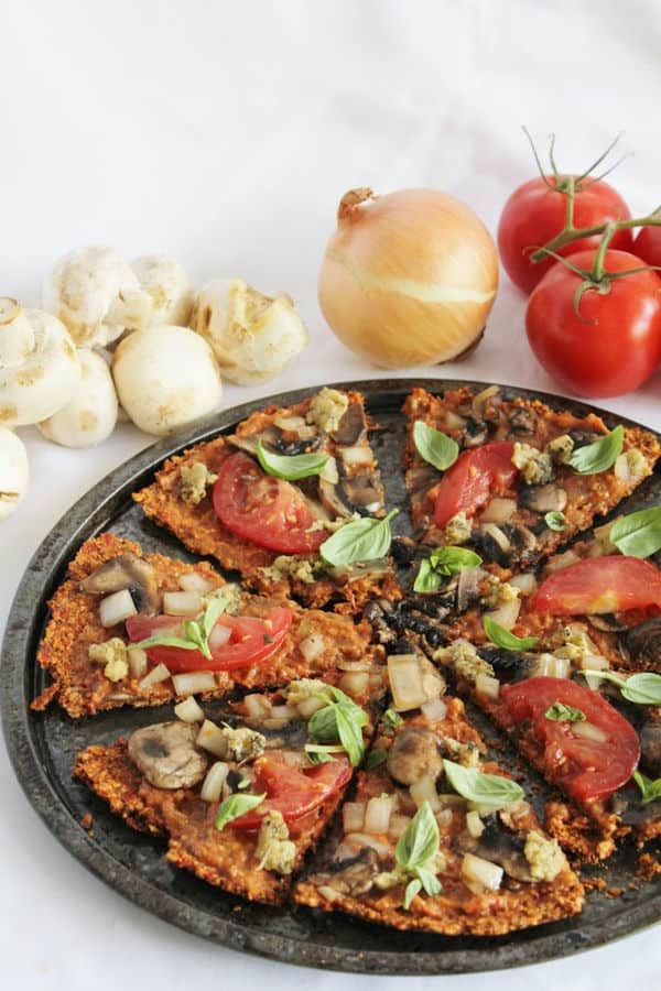 Red Pepper Flax Crust, Sun-Dried Tomato Sauce, Pine Nut Cheese and Veggie Pizza