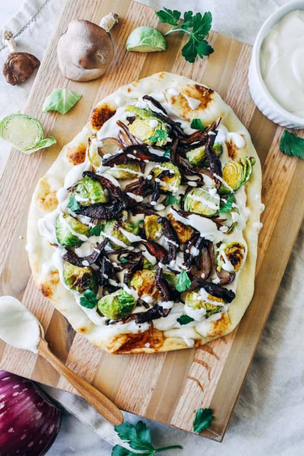 White Garlic Cashew Cream Pizza with Dijon Brussels and Shiitake Bacon
