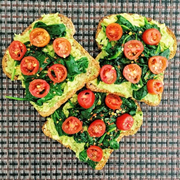 Smashed Avocado Toast with Wilted Spinach and Cherry Tomatoes