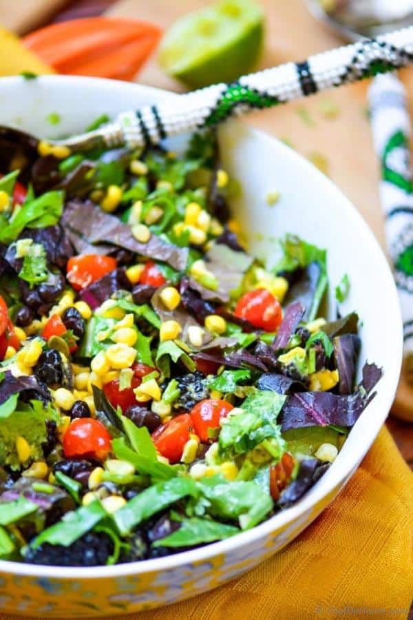 Mexican Black Bean and Berry Salad with Avocado Lime Dressing