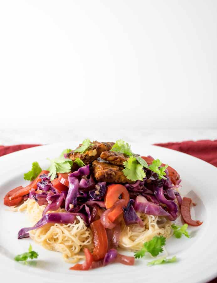 Tamarind Glazed Tempeh with Stir-Fried Vegetables and Rice Noodles