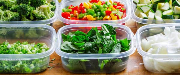 A variety of prepared produce items in different containers