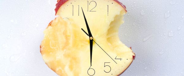 An eaten apple clock