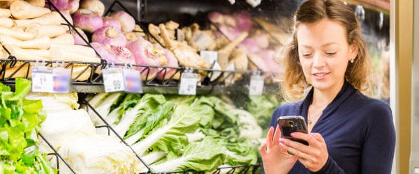 A lady using an app on her phone