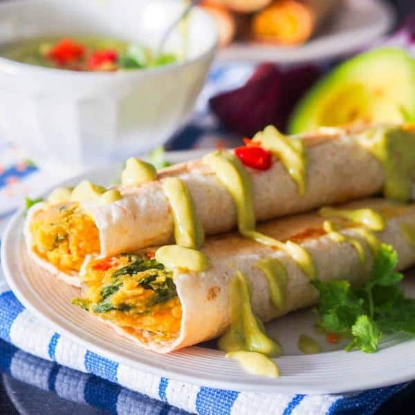 Taquitos with Lentils, Squash, Arugula and Avocado Crema